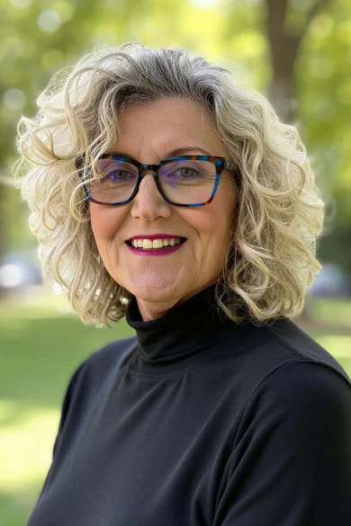 Portrait of Catie Morales, Associate Broker/REALTOR®.